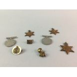 A LOT OF TWO WWII SERVICE MEDALS, CAMPAIGN STARS AND CAP BADGES