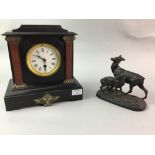 A FRENCH MANTEL CLOCK AND A SPELTER FIGURE GROUP OF TWO DEER