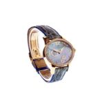 A LADY'S RARE GIRARD-PERREGAUX GOLD CATS EYE WATCH