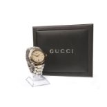 A GENTLEMAN'S GUCCI STAINLESS STEEL WATCH