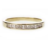 A DIAMOND HALF ETERNITY RING