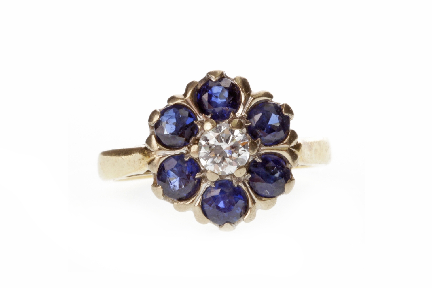 A DIAMOND AND BLUE GEM SET RING