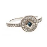 A BLUE AND WHITE DIAMOND RING