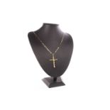 A CRUCIFIX PENDANT ON CHAIN