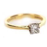 A PRINCESS CUT DIAMOND SOLITAIRE RING