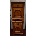 A PAIR OF VICTORIAN STYLE PINE BEDSIDE CUPBOARDS