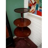 A NINETEENTH CENTURY MAHOGANY THREE-TIER CIRCULAR DUMBWAITER