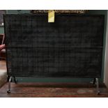 A LARGE WROUGHT IRON CHEVAL FIRE SCREEN