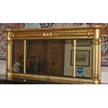 A REGENCY GILT THREE COMPARTMENT OVERMANTEL