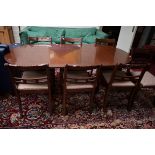 A REGENCY STYLE TWIN PEDESTAL MAHOGANY DINING TABLE