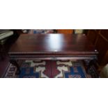 A MODERN RECTANGULAR MAHOGANY OCCASIONAL TABLE