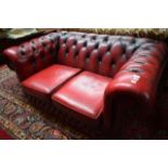 A TWO SEATER CHESTERFIELD SETTEE