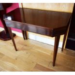 A NINETEENTH CENTURY FOLD OVER MAHOGANY CARD TABLE