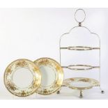 AN EPNS CAKE STAND AND SET OF THREE NORITAKE GILT PLATES, 46CM H, EARLY 20TH C