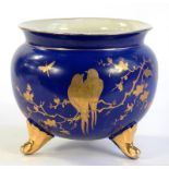 A STAFFORDSHIRE COBALT GROUND EARTHENWARE GLOBULAR JARDINIERE, DECORATED WITH RAISED GILT LOVEBIRDS,