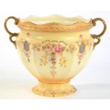 A FIELDING'S CROWN DEVON EARTHENWARE JARDINIERE, DECORATED WITH FLOWERS ON A SHADED APRICOT