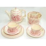 A VICTORIAN PUCE PRINTED EARTHENWARE TOY TEA SET, DECORATED WITH SCENES OF CINDERELLA, TEAPOT AND