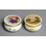 TWO ROYAL WORCESTER MINIATURE BOXES AND COVERS, 1922 painted with a landscape or fruit, 3.5cm