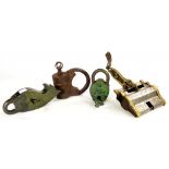 FOUR DECORATIVE SOUTH EAST ASIAN AND OTHER IRON OR IRON AND BRASS PADLOCKS, ONE IN THE FORM OF A