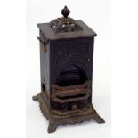 CAST IRON STOVE WITH PIERCED TOP, LATE 19TH C