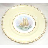 A ROYAL CROWN DERBY PLATE, PAINTED BY W. E. J DEAN, SIGNED, WITH THE YACHT 'FLIGHT', RESERVED ON A