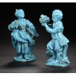 A PAIR OF SÈVRES STYLE TURQUOISE GLAZED AND GILT FIGURES OF CHILD FLOWER SELLERS, C1870 24cm h,