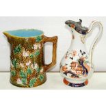 A GEORGE JONES RUSTIC MAJOLICA JUG, MOULDED WITH BLOSSOM, 19CM H, C1875 AND A CONTEMPORARY VICTORIAN