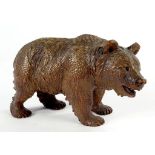 A SWISS CARVED LIMEWOOD MODEL OF A BEAR, WITH BLACK BOOT BUTTON EYES, 12CM H, C1900