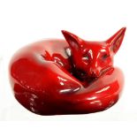 A ROYAL DOULTON FLAMBÉ MODEL OF A SLEEPING FOX, 8.5CM W, PRINTED MARK