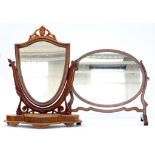 A VICTORIAN MAHOGANY SHIELD SHAPED DRESSING MIRROR AND ANOTHER SIMILAR