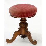 A VICTORIAN WALNUT PIANO STOOL