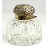 A VICTORIAN SILVER MOUNTED CUT GLASS INKWELL OF SHOULDERED FORM WITH BUN CAP, 11CM H, LONDON 1890