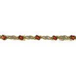 A RED AND WHITE STONE SET PIERCED 9CT GOLD BRACELET, 8.3G