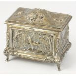 A DECORATIVE EDWARDIAN SILVER JEWEL CASKET, THE SIDES EMBOSSED WITH DEER, BOAR, PHEASANTS AND DUCKS,