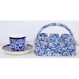 A VICTORIAN BLUE PRINTED EARTHENWARE EGG STAND AND SIX EGG CUPS, 13CM H, C1880 AND A CONTEMPORARY