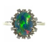 A BLACK OPAL DOUBLET RING IN WHITE GOLD, 3.7G