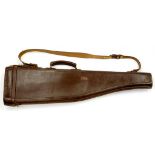 A LEATHER LEG OF MUTTON SHOTGUN CASE