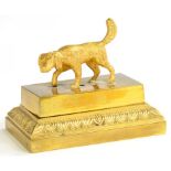 A FRENCH GILT BRASS AND BRONZE INKWELL AND COVER, MOUNTED WITH A DOG, 10CM W, 19TH C