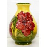 A MOORCROFT HIBISCUS YELLOW GROUND BALUSTER VASE, 19.5CM H, IMPRESSED MARKS, PAINTED INITIALS, C1970