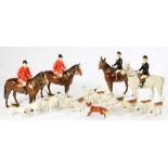 TWO BESWICK MODELS OF A HUNTSMAN ON STANDING HORSE, TWO BESWICK MODELS OF A HUNTSWOMAN ON STANDING