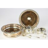 A PAIR OF VICTORIAN PLATED WINE COASTERS, WITH GADROONED RIM AND INSET TURNED WOOD BASE, 17CM D, A