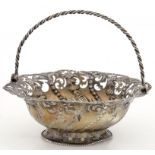 A GEORGE III PIERCED AND EMBOSSED SILVER BASKET, WITH SWING HANDLE, ON PIERCED FOOT, 13.5CM D,