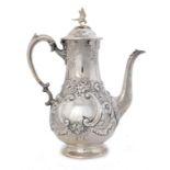 A VICTORIAN SILVER BALUSTER COFFEE POT CHASED WITH FLOWERS, 30CM H, BY DJ & C HOULE, LONDON 1864,