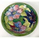 A MOORCROFT CLEMATIS PATTERN DISH, 22CM D, IMPRESSED MARKS, PAINTED INITIALS, C1960