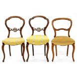 A PAIR OF WALNUT BALLOON BACK CHAIRS AND ANOTHER SIMILAR