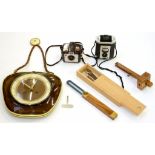 A KODAK BAKELITE HOLIDAY BROWNIE CAMERA, A TWIN LENS REFLEX CAMERA, A MID CENTURY WALL CLOCK, A