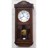 AN OAK WALL CLOCK WITH ENAMEL DIAL, CIRCA 1930'S