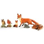 TWO BESWICK FOXES, A BADGER AND A BIRD, LARGEST FOX 13.5CM H, PRINTED MARK AND TWO OTHER ITEMS