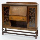 A 1930'S OAK SIDE BY SIDE BUREAU BOOKCASE, 110 X 122CM