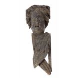 A RARE ENGLISH LIMEWOOD CARVING OF THE HEAD AND WINGS OF A CHERUB, ATTRIBUTED TO THE WORKSHOP OF